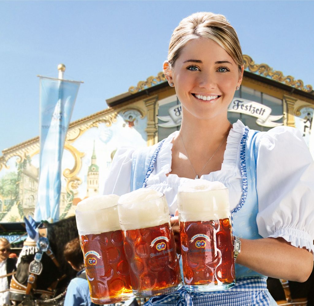 woman wearing a traditional Bavarian costume at a beer festival