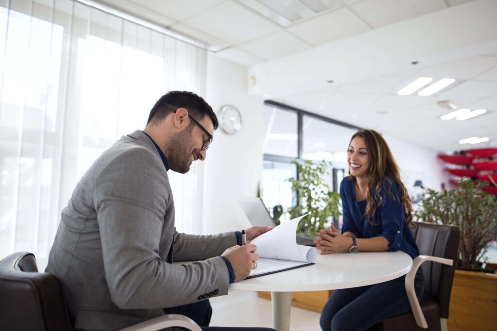 Woman using Portuguese phrases at a job interview