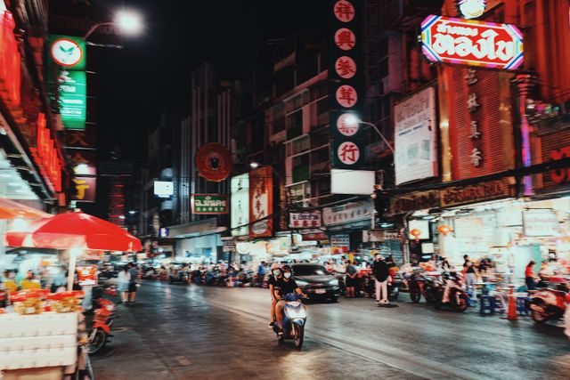 Busy night market street in Thailand
